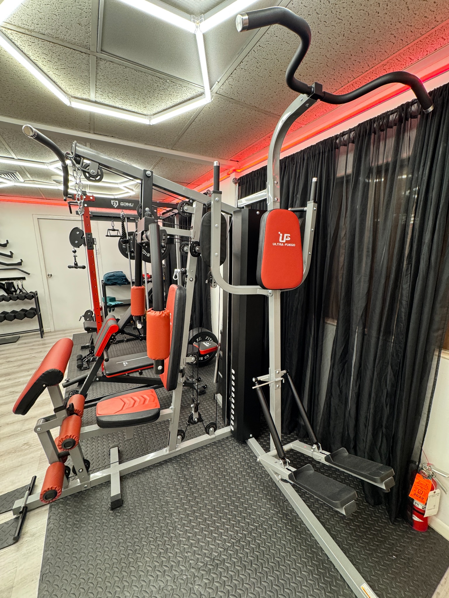 Multi-station strength machine at ArubaSalsa Gym